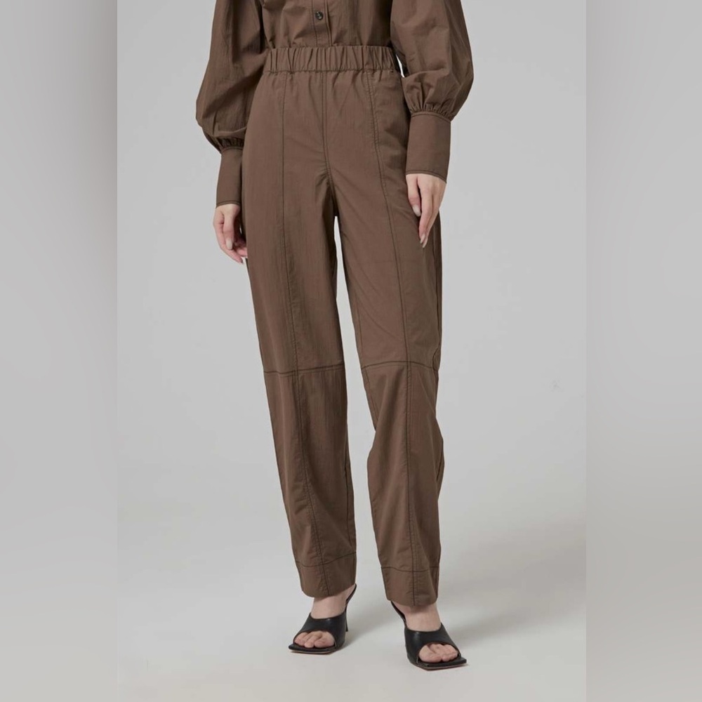 GANNI Brown curve pants. Size 42. Never worn